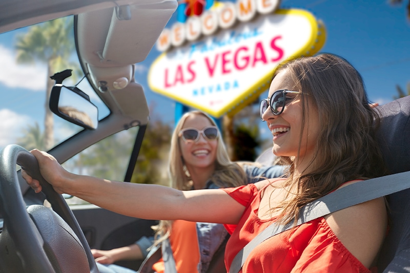 Two ladies driving Las Vegas Strip