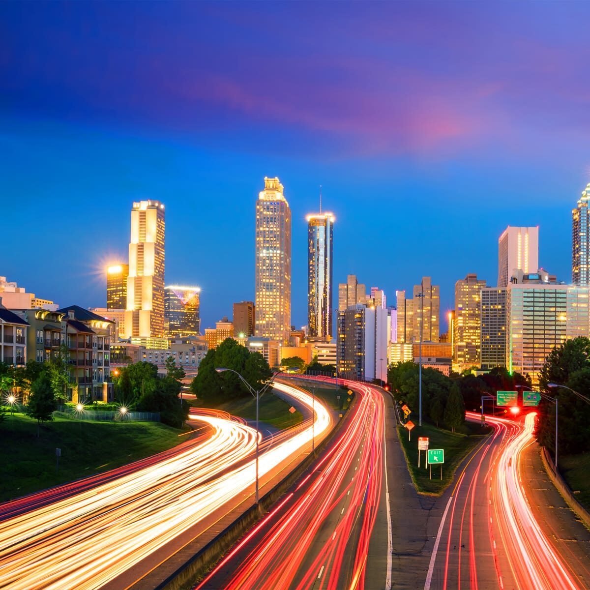 Highway Running Through City At Night