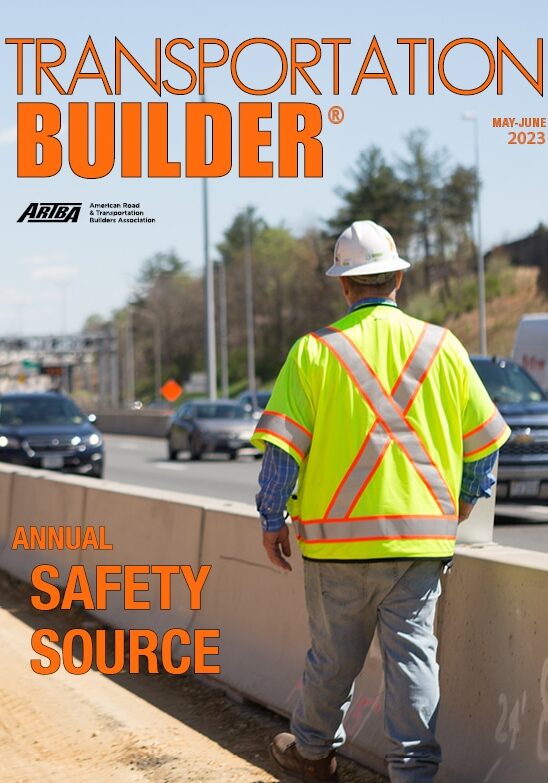 Magazine Cover Road Worker Wearing Yellow Vest and Hat